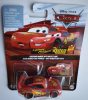 Disney Pixar Verdák (Cars) – Villám McQueen Rust-eze táblával fém kisautó 1:55 (Mattel)